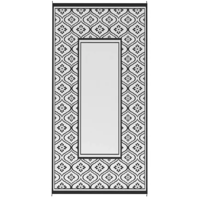 Light side of a black and white outdoor rug with a floral border and plain rectangular center.