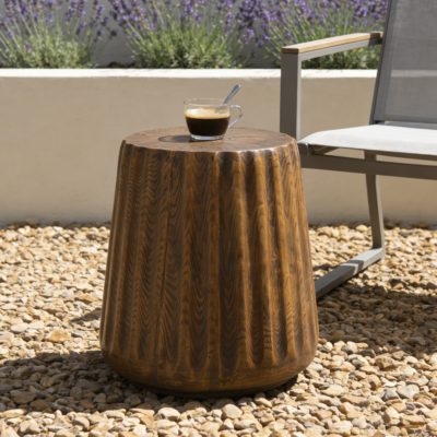 Brown Tree-Stump MGO Side Table – Patio Brown tree-stump MGO side table beside a patio chair