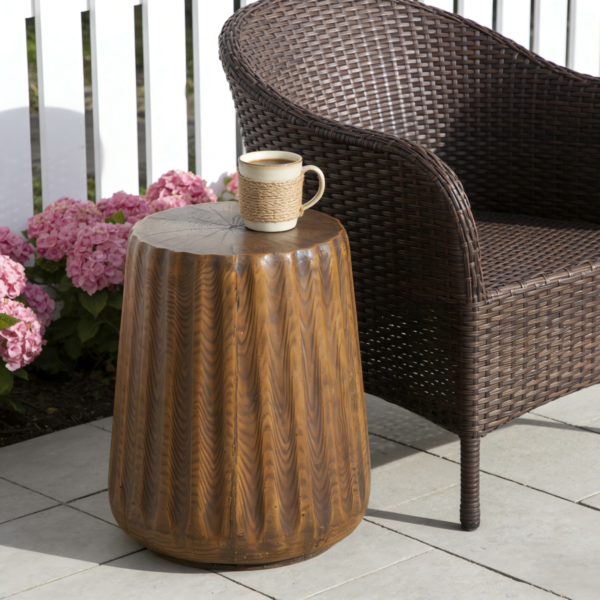 Brown Tree-Stump Side Table – Woven Seating Tree-stump side table with a brown wood-grain finish beside woven seating