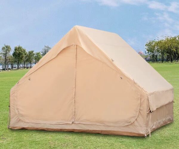 Khaki inflatable camping tent on grass, with the fabric entrance closed.