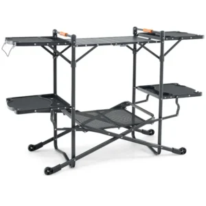 Black folding camping prep table with an aluminum center top, four side tables and a lower storage shelf.