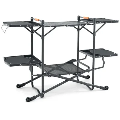 Black folding camping prep table with an aluminum center top, four side tables and a lower storage shelf.